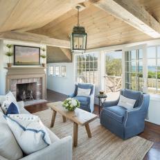 Neutral Coastal Sitting Room With Blue Armchairs