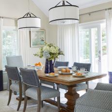 Transitional Dining Room With Blue Chairs