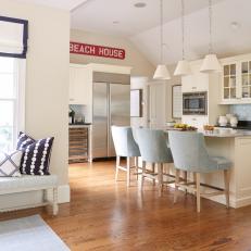 Open Plan Coastal Kitchen With Red Sign