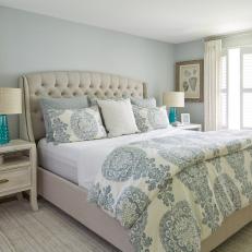 Blue Coastal Bedroom With Striped Rug
