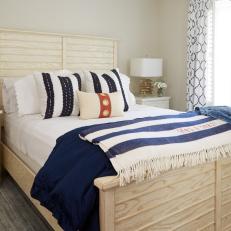 Neutral Coastal Bedroom With Striped Throw