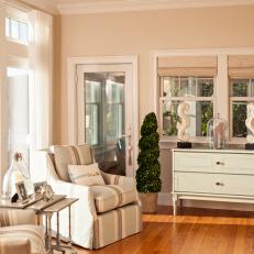 Neutral Coastal Sitting Room With Topiaries