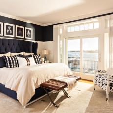 Blue and White Coastal Bedroom With Leather Bench