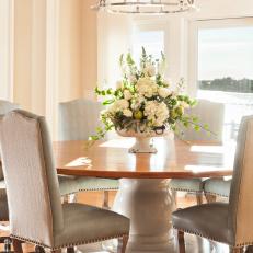 Round Dining Table and White Centerpiece