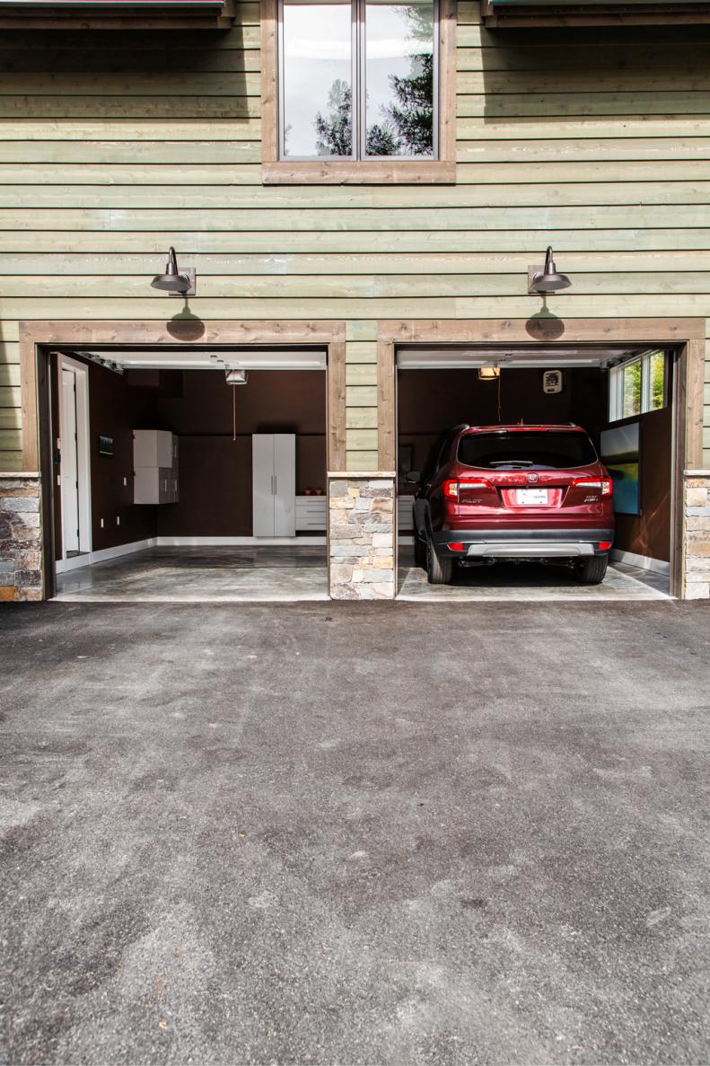 Ideal for this mountain climate, the heated garage with energy-efficient front doors provides space for parking cars as well as working on various home and garden projects in a comfortable setting. 