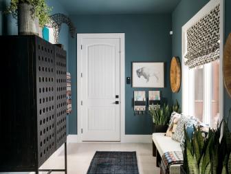 Blue Transitional Mudroom Has Style to Spare Thanks to Artful Decor