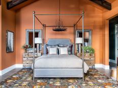 Iron Canopy Bed Is the Star of Rust-Colored Master Suite