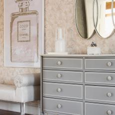 Gray Dresser and Pink Wallpaper