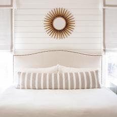 White Contemporary Bedroom With Gold Sun Mirror