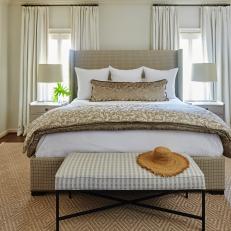 Neutral Transitional Bedroom With Straw Hat