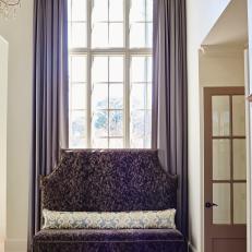 Brown Velvet Bench and Purple Curtains