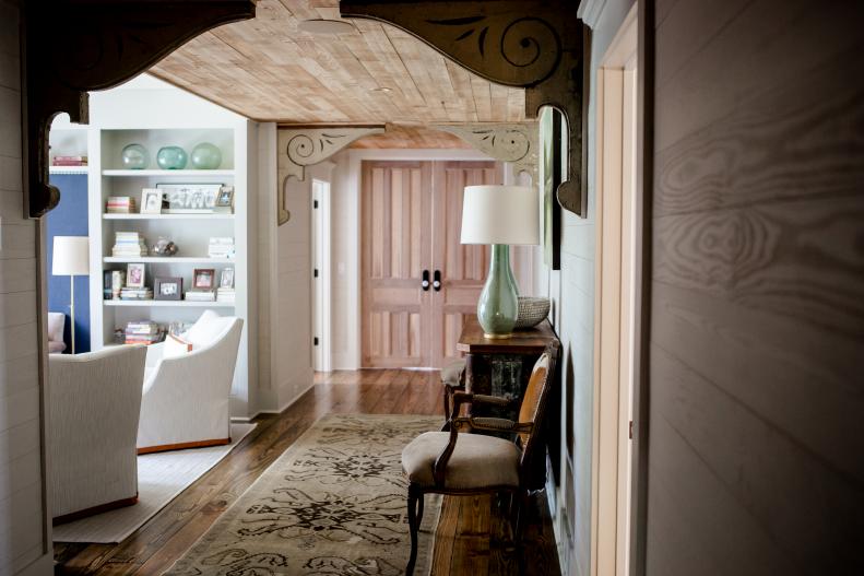 country-style entryway with reclaimed wood ceiling