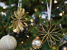 Turn trash into treasure with this easy DIY. Find out how to upcycle empty paper towel rolls into glittering Christmas tree ornaments.