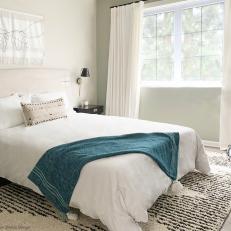 Neutral Contemporary Bedroom With Striped Rug