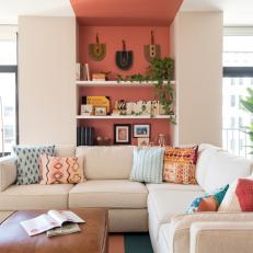 Coral Accent Wall Enlivens Contemporary Living Room