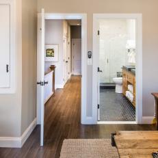 Hardwood Floors Encourage Flow to Eclectic Master Bedroom