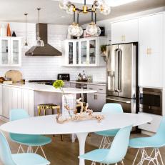 Open Plan Kitchen With Blue Dining Chairs