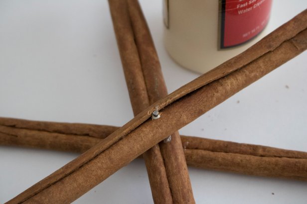 DIY cinnamon stick snowflake to accent your home during the holidays.