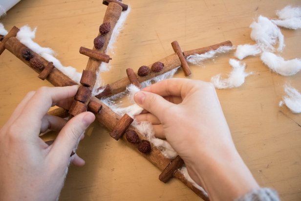 DIY cinnamon stick snowflake to accent your home during the holidays.