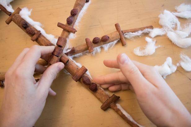 DIY cinnamon stick snowflake to accent your home during the holidays.