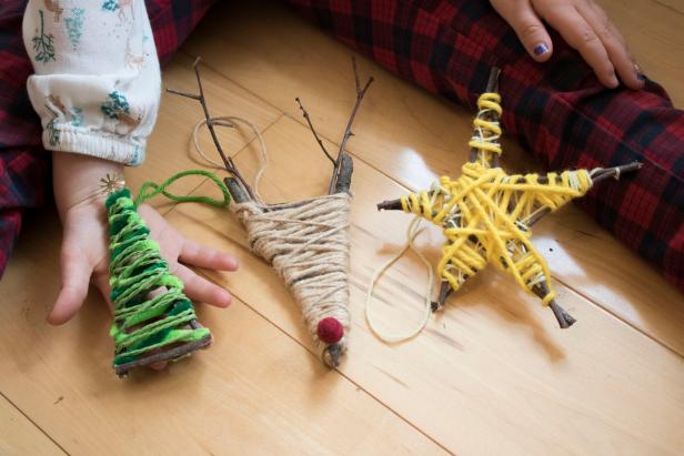 DIY ornaments using twigs and scrap yarn.