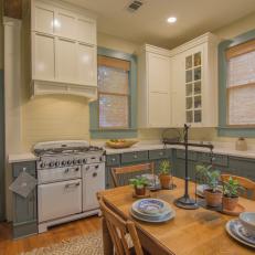 Contemporary Yellow Kitchen with Custom Green Cabinets 