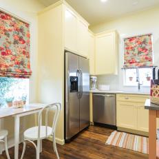 Contemporary Yellow Kitchen with Blue, Red and Pink Floral Curtains 