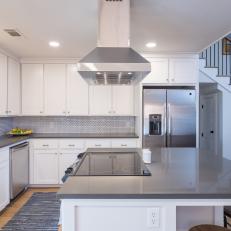 Modern White Kitchen with Stainless Steel Range Hood