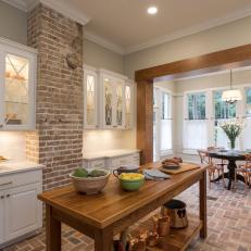 Neutral French Country Kitchen with Brown Brick Floor