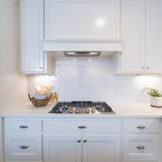 Modern White Kitchen with White Subway Tile Backsplash