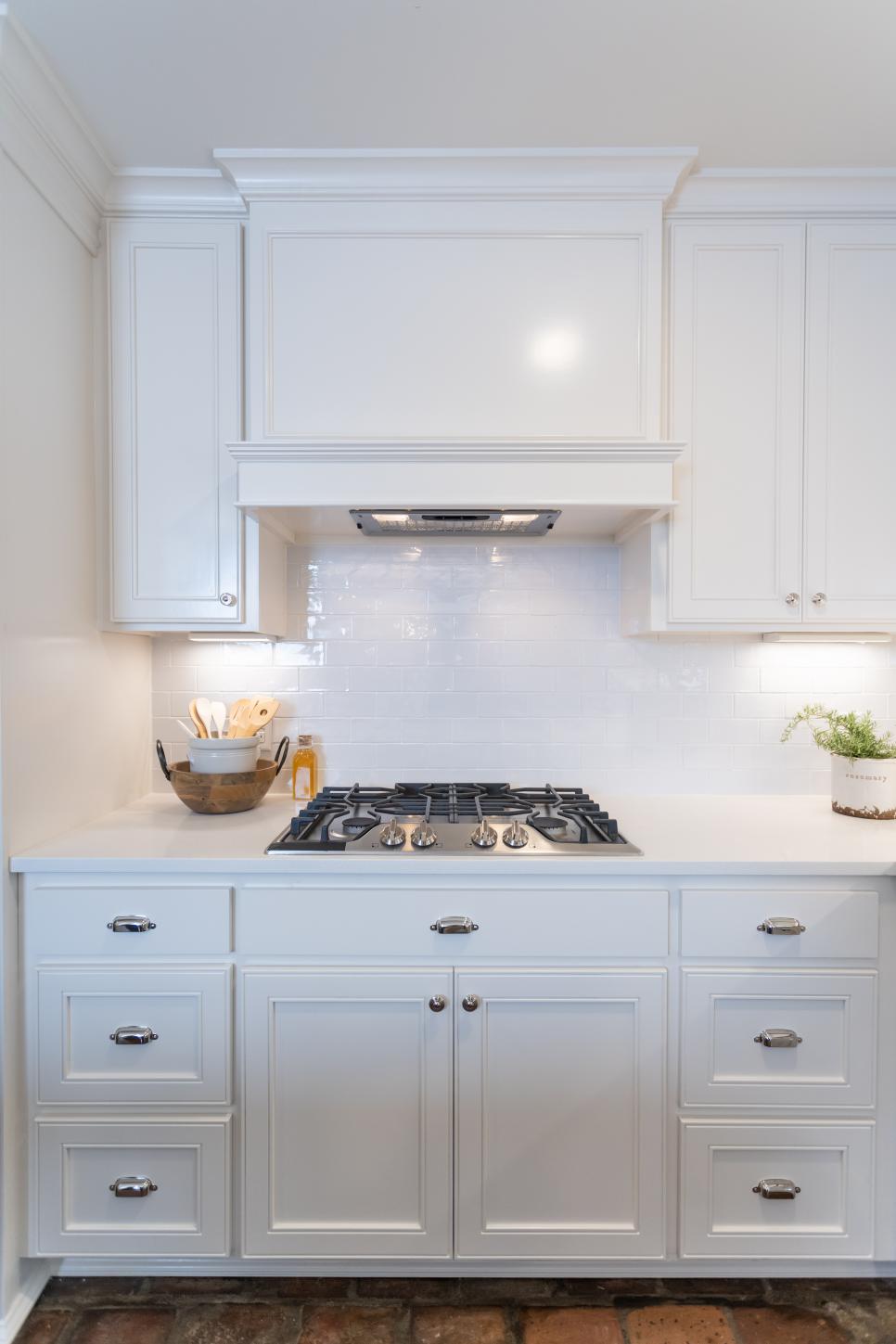 Modern White Kitchen with White Subway Tile Backsplash | HGTV