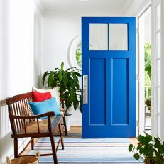 Contemporary Foyer With Blue Front Door