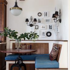 Mediterranean Banquette With Gallery Wall