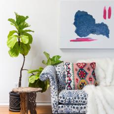 Multicolored Eclectic Sitting Area With Plant