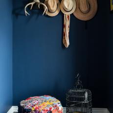 Eclectic Blue Hall With Birdcage
