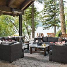 Covered Patio Complete With Plush Gray Sectionals