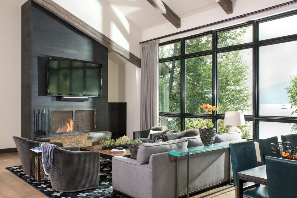 Modern Living Room Makes Statement With Sleek Black Fireplace | HGTV