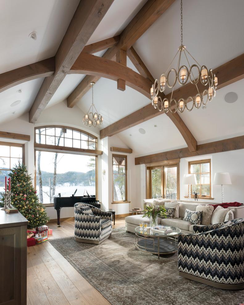 transitional living room with soaring ceilings