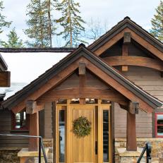 Montana Lake House With Sleek, Stone-and-Wood Entryway