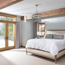 Serene, Neutral Master Suite With Reclaimed Wood Beams