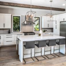 Gray Open Plan Kitchen With Exposed Beams