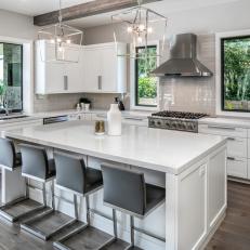 Gray Open Plan Kitchen With White Cabinets