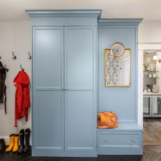 Mudroom With Blue Cabinets