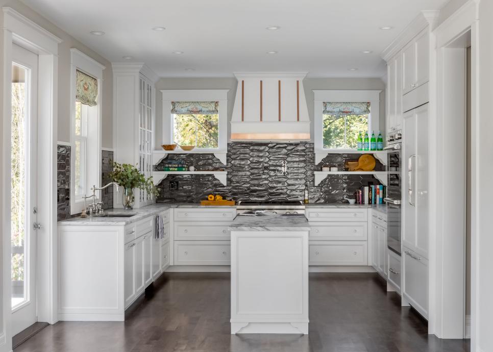 Black and White Open Plan Kitchen With Copper Hood | HGTV