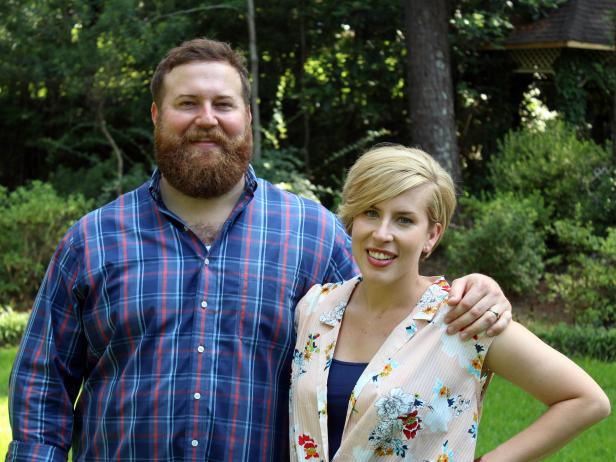 Hosts Ben and Erin Napier pose for a photo during Watts family home tours on Home Town