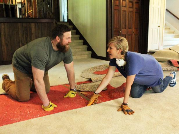 Hosts Ben and Erin Napier share a laugh behind the scenes while renovating the Watts home on Home Town