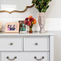 Teen Bedroom Includes Gray Dresser Topped With Boho Decor