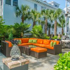 Patio With Orange and Brown Sectional