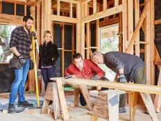 L-R Drew Scott (Property Brothers), Maureen McCormick (Marcia), Jonathan Scott (Property Brothers), and Christopher Knight (Peter) working on renovations, as seen on A Very Brady Renovation.