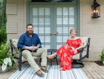 As seen on Home Town, Ben (L) and Erin (R) Napier have completely renovated the brick split level home. The exterior landscaping was completely redone to a more subdued look and the wrought iron railing, windows, doors and trim were given new paint. (portrait)